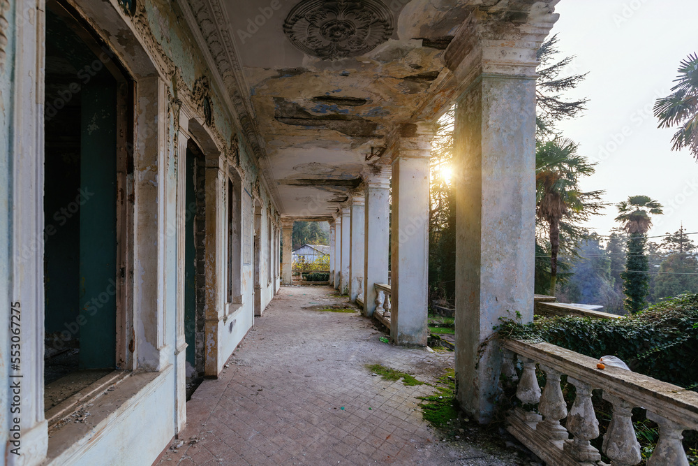 Old colonnade in an abandoned mansion