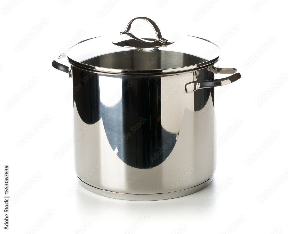 Large stainless steel cooking pot with glass lid on top elevated view Large stainless steel cooking pot with glass lid on top elevated view