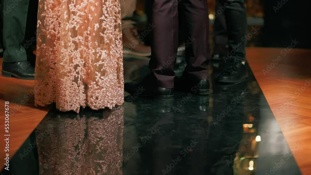 Legs view: Beautiful people at a New Year's event Legs view: Beautiful people at a New Year's event