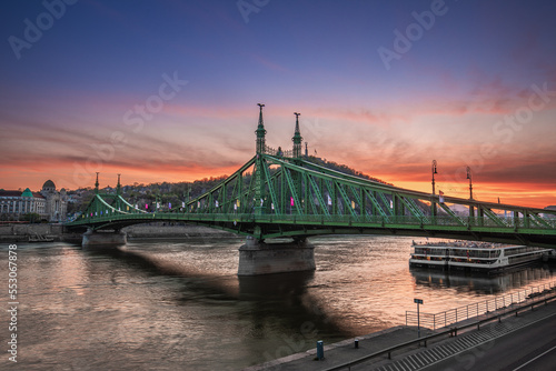 Budapest  Hungary - Panoramic view of Liberty Bridge at sunset with Gellert Hill and Statue of Liberty at background