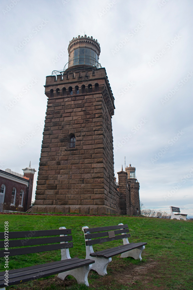 Non operational twin historic lighthouses in Highlands, New Jersey, overlooking Sandy Hook Bay in a vertical aspect -13