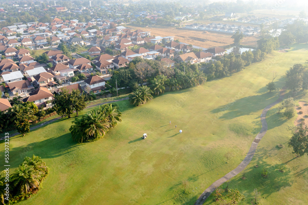 Aerial view Green Golf course in the morning.