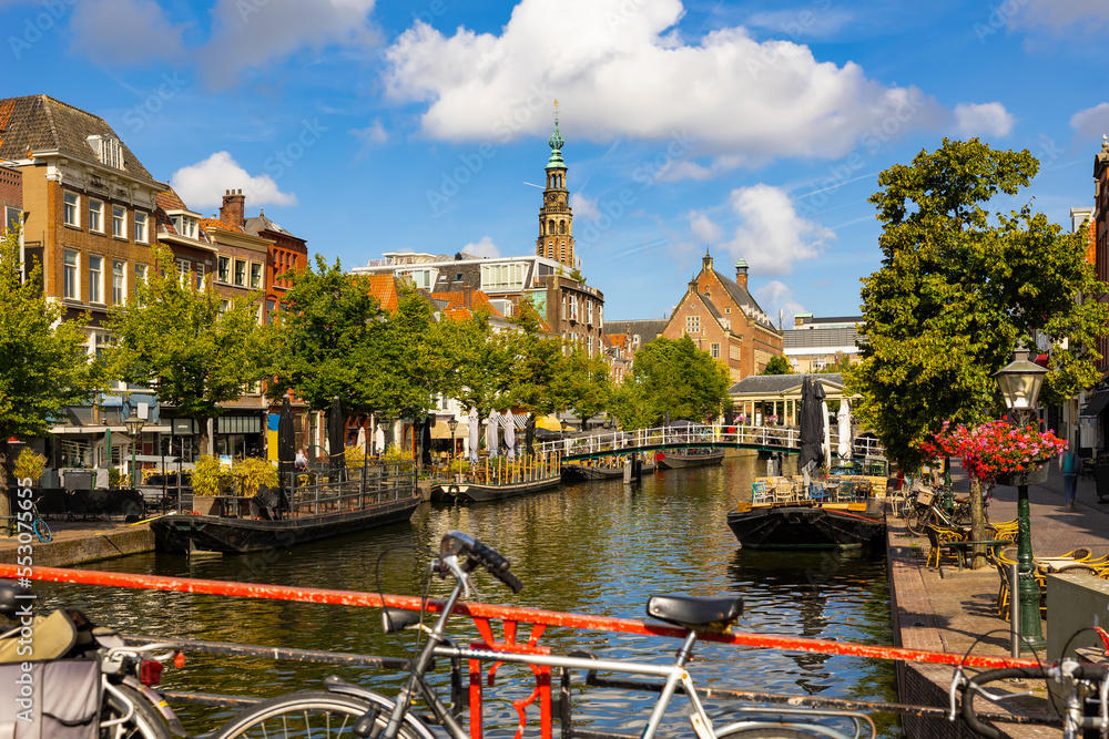 Picturesque summer landscape with a view of the city streets of Leiden and the Old Rhine River, Netherlands