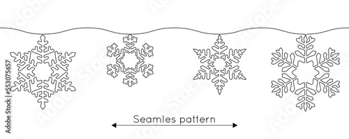 One continuous line drawing of christmas snowflakes seamless pattern. Winter holidays and cold crystal flake symbol in simple linear style. Holiday icon in editable stroke. Doodle vector illustration