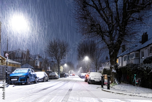 Snowy night in West London suburb at Christmas time