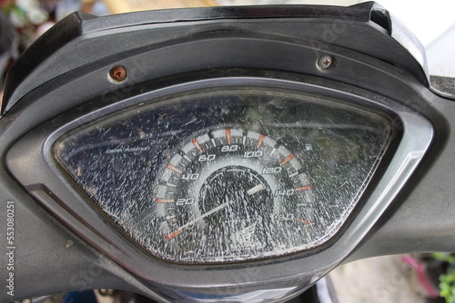 Cilegon, Banten, Indonesia - November 20 2020: Close-up of broken speedometer cover glass on a Honda motorbike