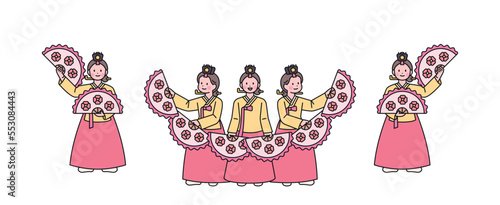 Korean traditional dance. Dancers wearing hanbok perform a beautiful fan dance.
