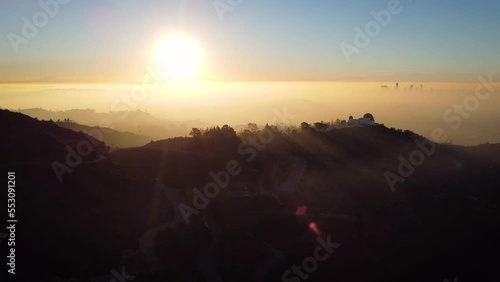 Misty morning over los Angeles along with Griffith observatory with the Westside skyline of the city in the background