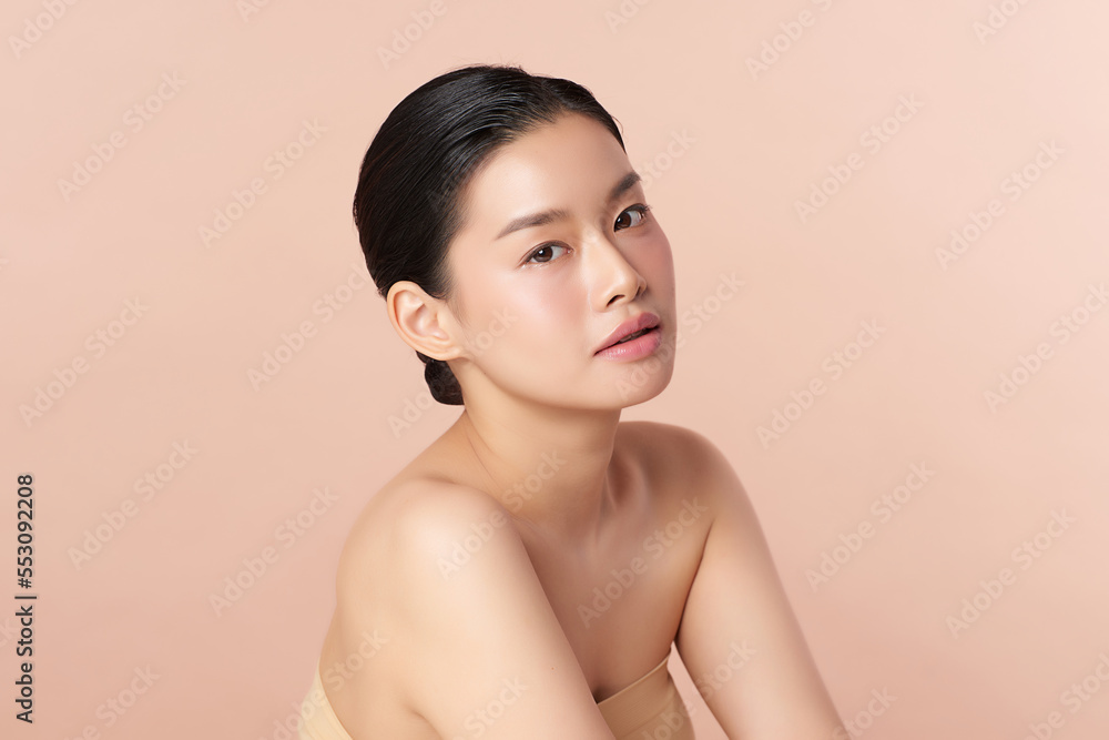 Beautiful young asian woman with clean fresh skin on beige background, Face care, Facial treatment, Cosmetology, beauty and spa, Asian women portrait. Beautiful young asian woman with clean fresh skin on beige background, Face care, Facial treatment, Cosmetology, beauty and spa, Asian women portrait.