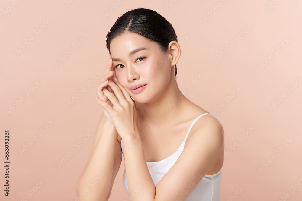 Beautiful young asian woman with clean fresh skin on beige background, Face care, Facial treatment, Cosmetology, beauty and spa, Asian women portrait. Beautiful young asian woman with clean fresh skin on beige background, Face care, Facial treatment, Cosmetology, beauty and spa, Asian women portrait.