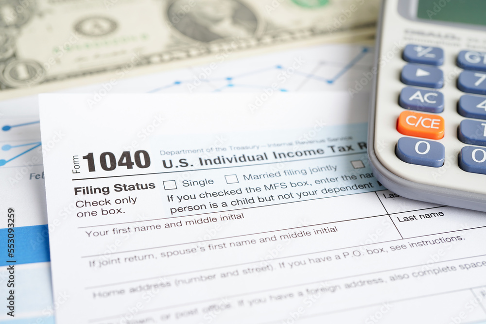 Tax form 1040 U.S. Individual Income Tax Return, business finance concept. Tax form 1040 U.S. Individual Income Tax Return, business finance concept.