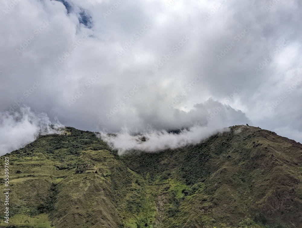 green mountains with clouds in the ecuadorian alps