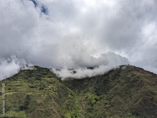 green mountains with clouds in the ecuadorian alps