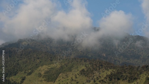 green mountains with clouds in the ecuadorian alps