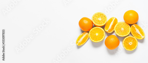 Fresh oranges on white background with space for text