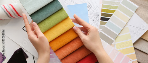 Woman with fabric samples a...