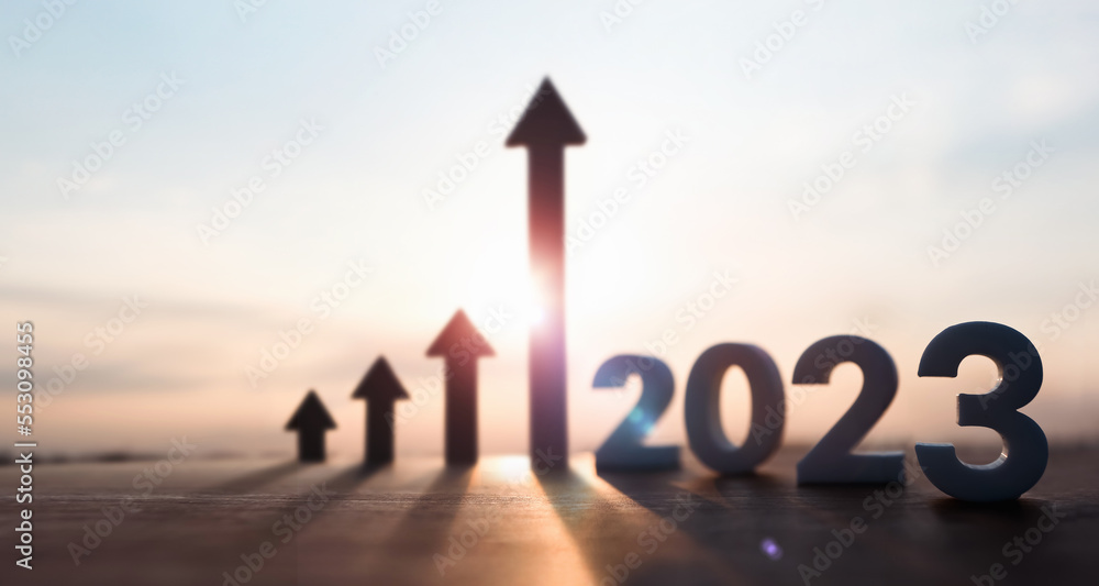 High rising arrow and bright rising sun 2023 new year sunrise and stock finance economy industry growth investment target concept
 - obrazy, fototapety, plakaty 