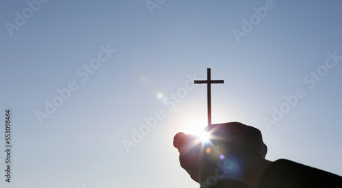Canvas Print Background with a bright shining sun and a holy cross symbolizing the death and