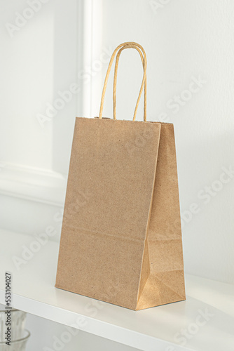 Brown kraft paper bags isolated on white background.