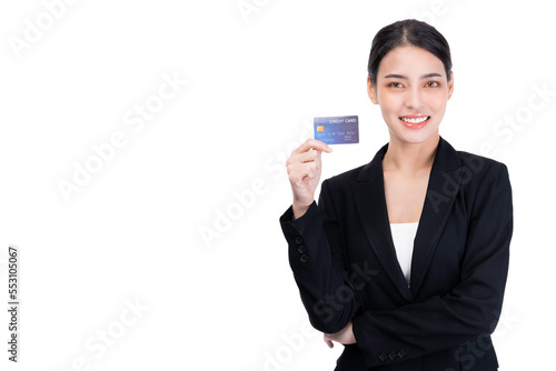 Beautiful young business woman holding credit card isolated over white background and copy space Happy businesswoman spending money by using credit card Smiling beautiful woman rejoice look at camera