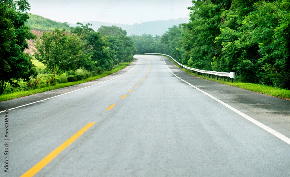 Winding road through a low mountain