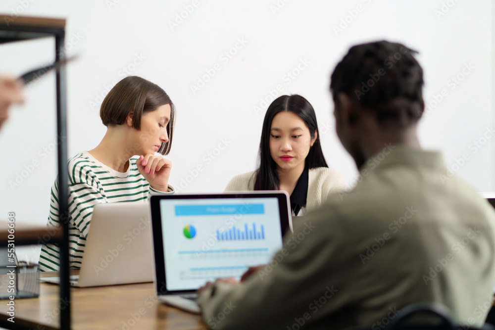 young business people working in a coworking center. young business people working in a coworking center.
