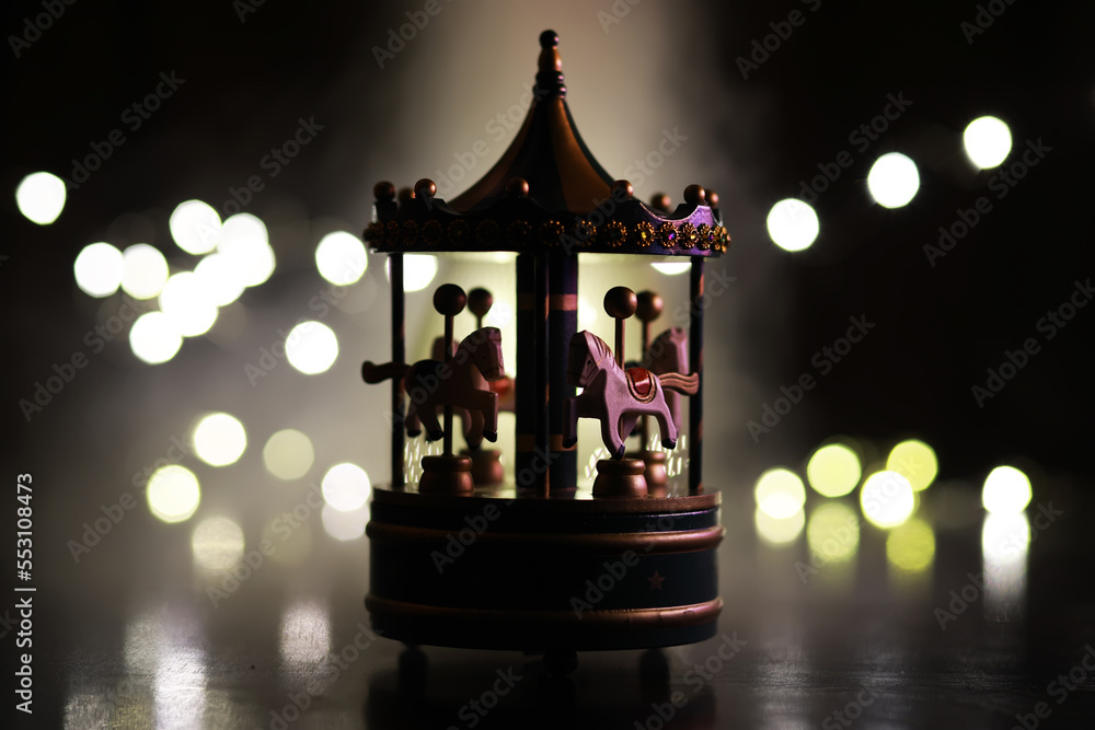 light carousel at night with horses in winter Carousel fun time Christmas night time light carousel at night with horses in winter Carousel fun time Christmas night time