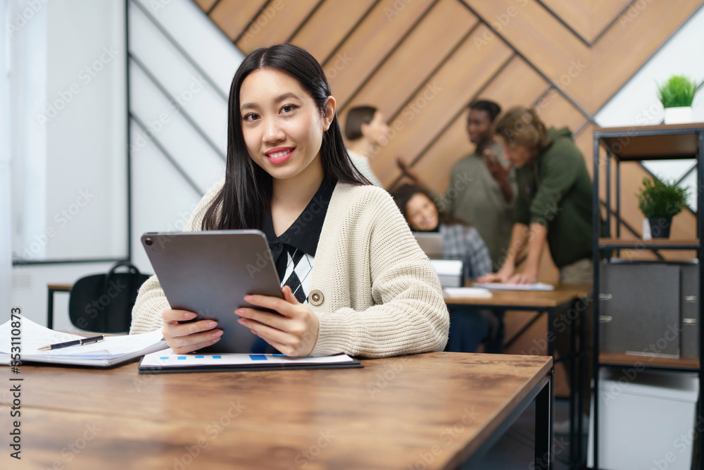 portrait of a young business woman with a digital tablet. portrait of a young business woman with a digital tablet.