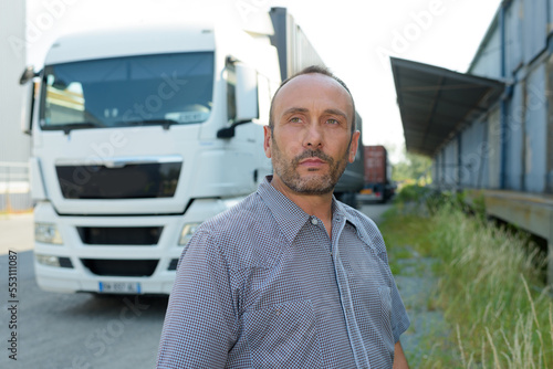 Wallpaper Mural handsome driver near big modern truck outdoors Torontodigital.ca