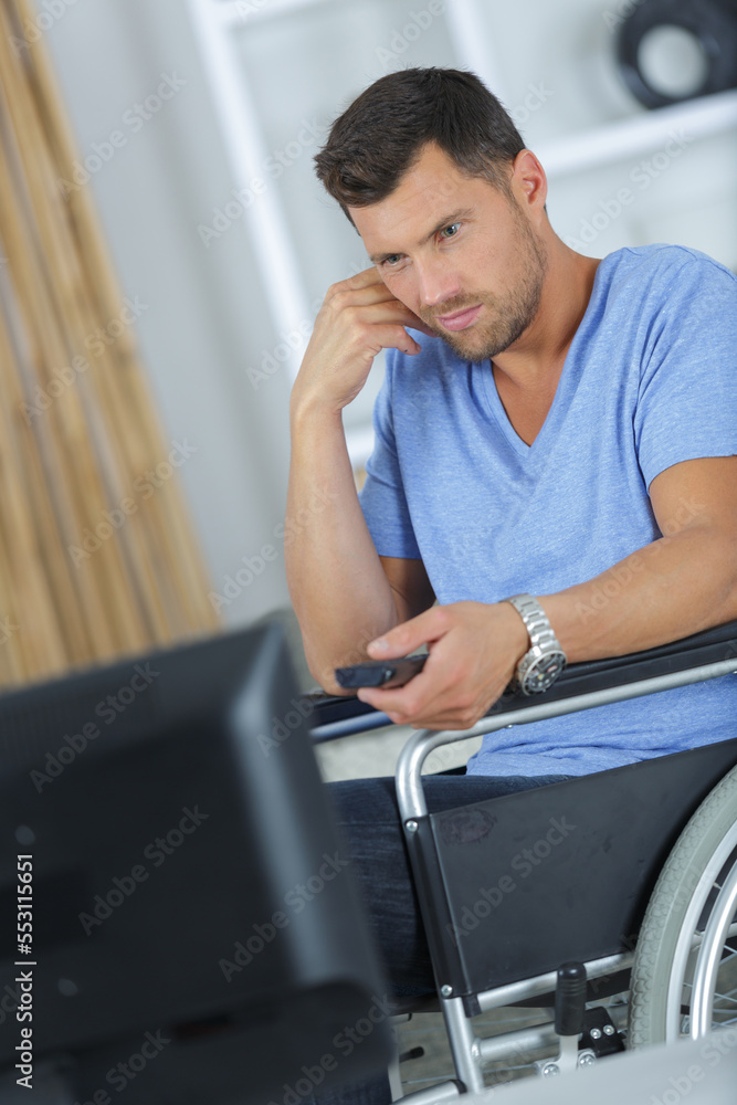 handicapped man watching tv