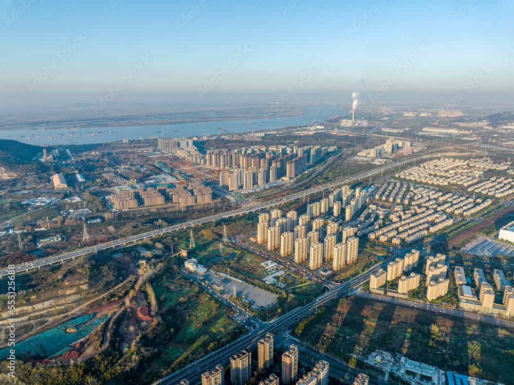 Aerial photography of city buildings along the river