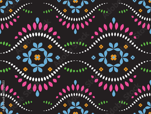 Ethnic abstract ikat art. Seamless pattern in tribal, folk embroidery, and Mexican style. Aztec geometric art ornament print.Design for carpet, wallpaper, clothing, wrapping, fabric, cover, textile