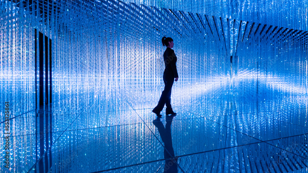 Businesswoman walking in the beautiful bokeh light Businesswoman walking in the beautiful bokeh light