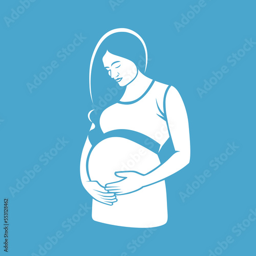 Pregnant woman hugging her unborn child.