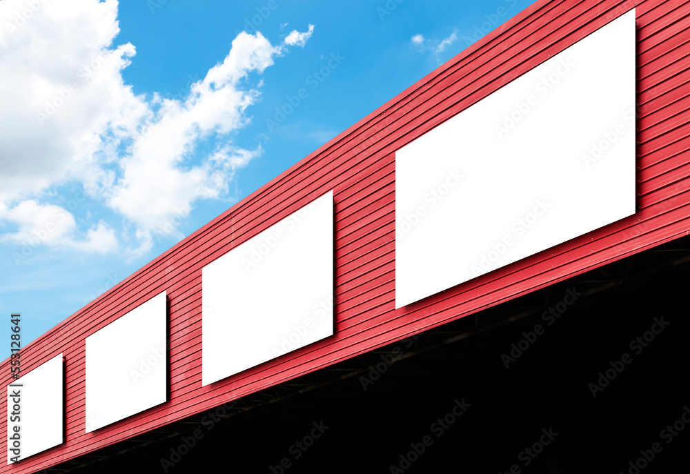 Mock up billboard on building with blue sky background Mock up billboard on building with blue sky background