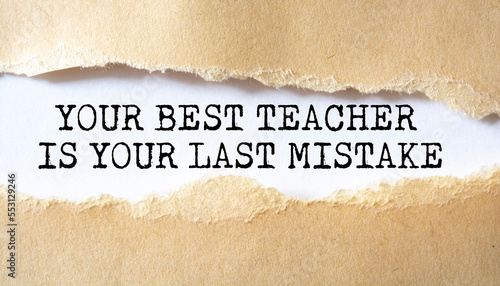 Your Best Teacher Is Your Last Mistake word written under torn paper.