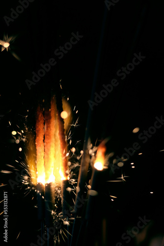 Blazing handheld firework as background