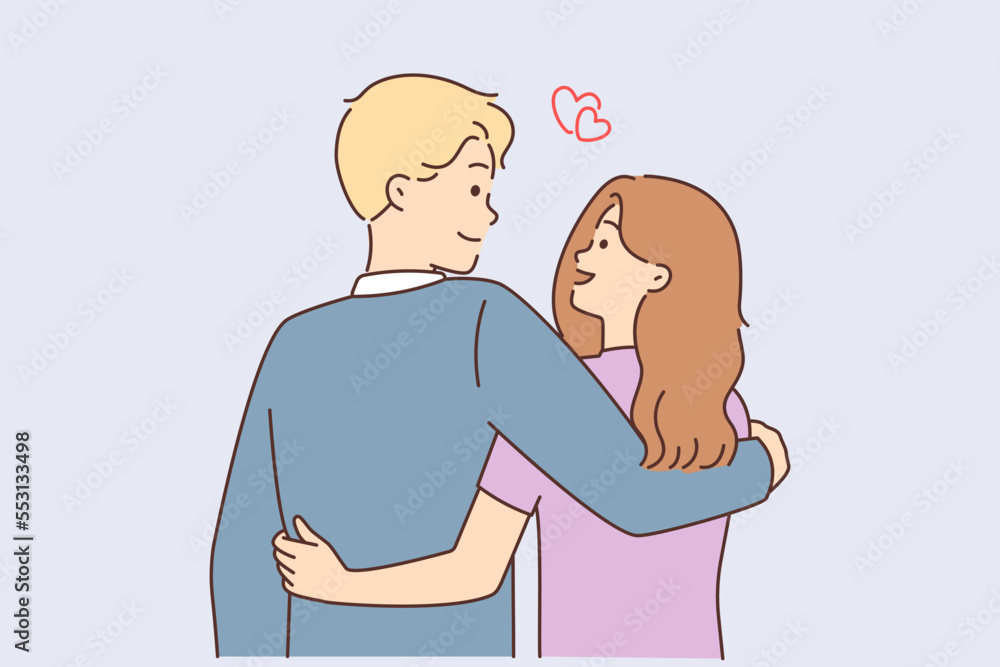Happy young couple in love hugging Happy young couple in love hugging