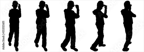 Group of teenagers dancing. A teenager in a cap and tracksuit is dancing. Character for motion animation. Dancing boy in a fashionable cap. Side view, front. Five black silhouettes isolated on white