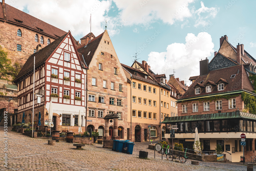 Germany, Bavaria, Nuremberg, Historic townhouses with well in center Germany, Bavaria, Nuremberg, Historic townhouses with well in center
