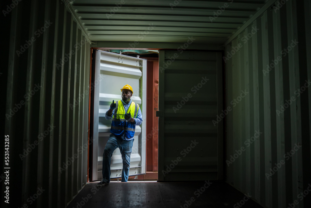 Container operator inspection containers box from cargo ship for export and import at container yards. Container operator inspection containers box from cargo ship for export and import at container yards.