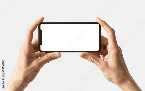 Phone mockup in hand - clipping path, Studio shot of smartphone with blank white phone screen for web site design, app for mobile phone and advertisement