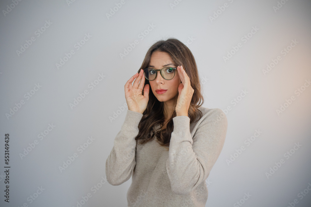 Woman trying on glasses Woman trying on glasses
