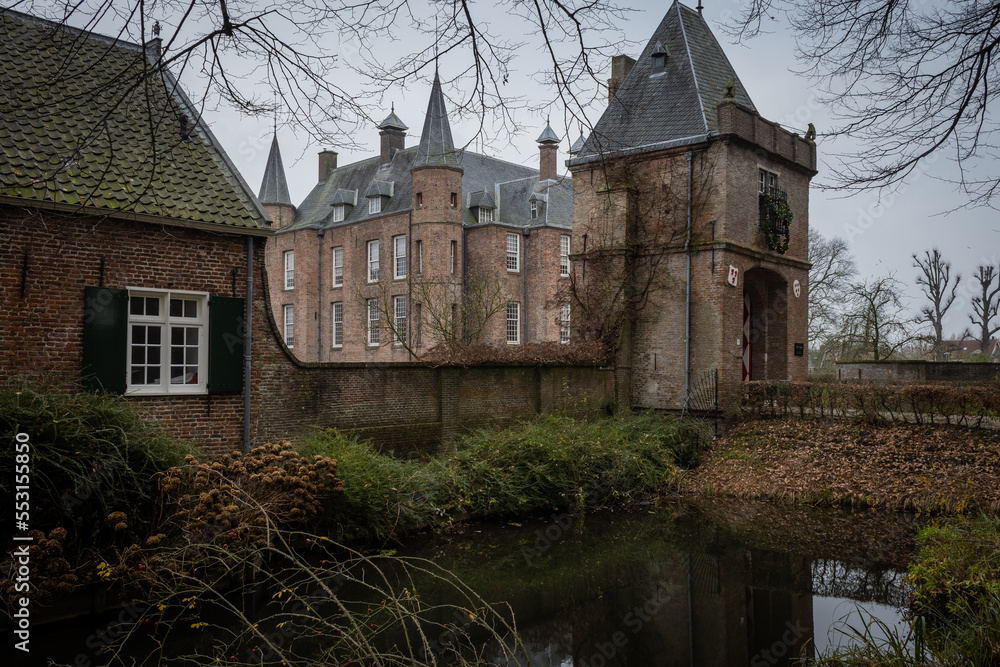 The entrance to the historic building Zuylen castle or slot Zuylen as it is called in Dutch on a cold winter day. includes the bridge, keep, gate moat and main building