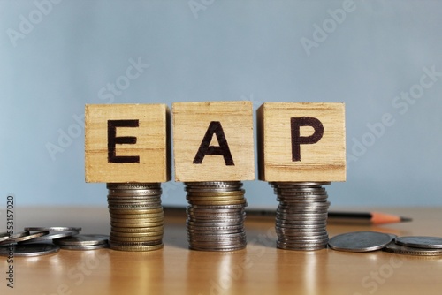 EAP concept, employee assistance program concept on wooden blocks. 