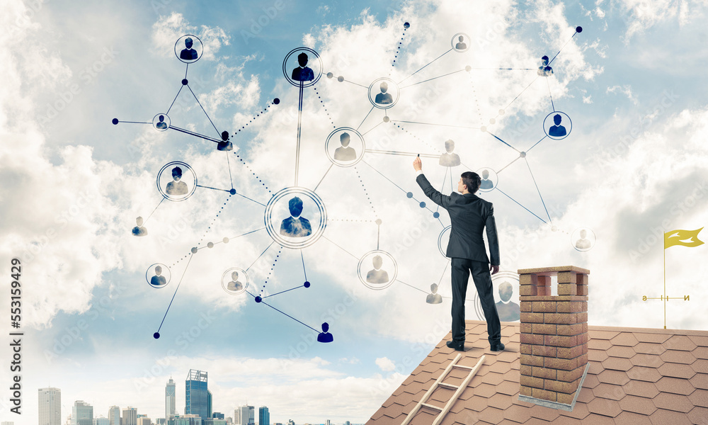 Businessman on house roof presenting networking and connection c Businessman on house roof presenting networking and connection c