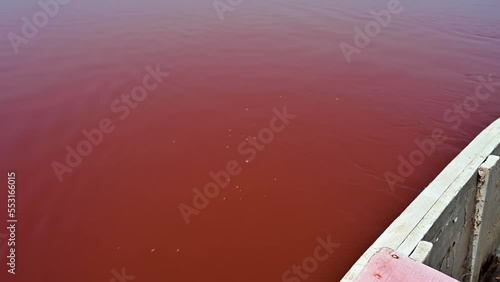Red water in Lake Retba near Dakar, Senegal photo