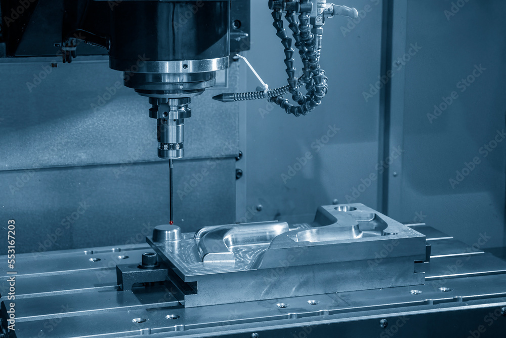 The CMM machine measuring the injection mold parts. The CMM machine measuring the injection mold parts.
