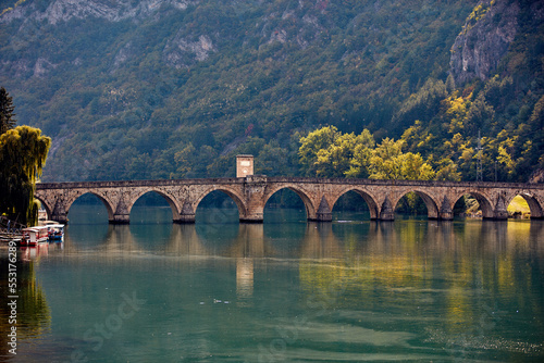 Bridge on river Drina, famous historic Ottoman architecture in Visegrad, Bosnia and Herzegovina. photo