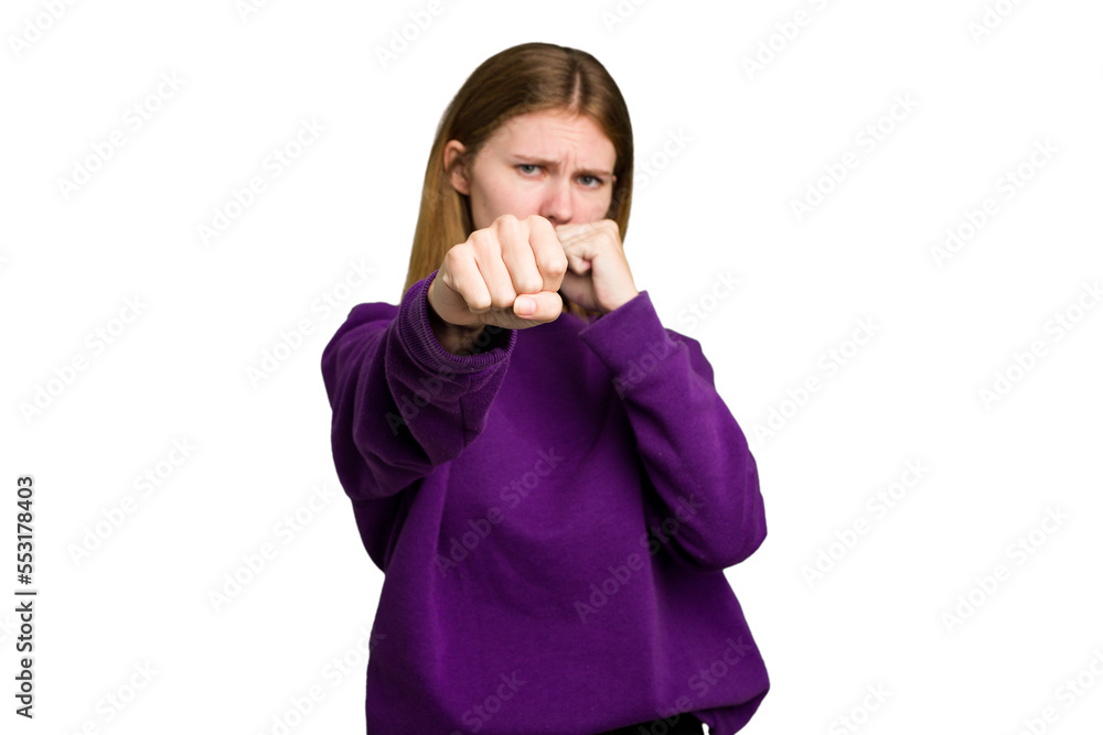 Young caucasian woman isolated throwing a punch, anger, fighting due to an argument, boxing. Young caucasian woman isolated throwing a punch, anger, fighting due to an argument, boxing.